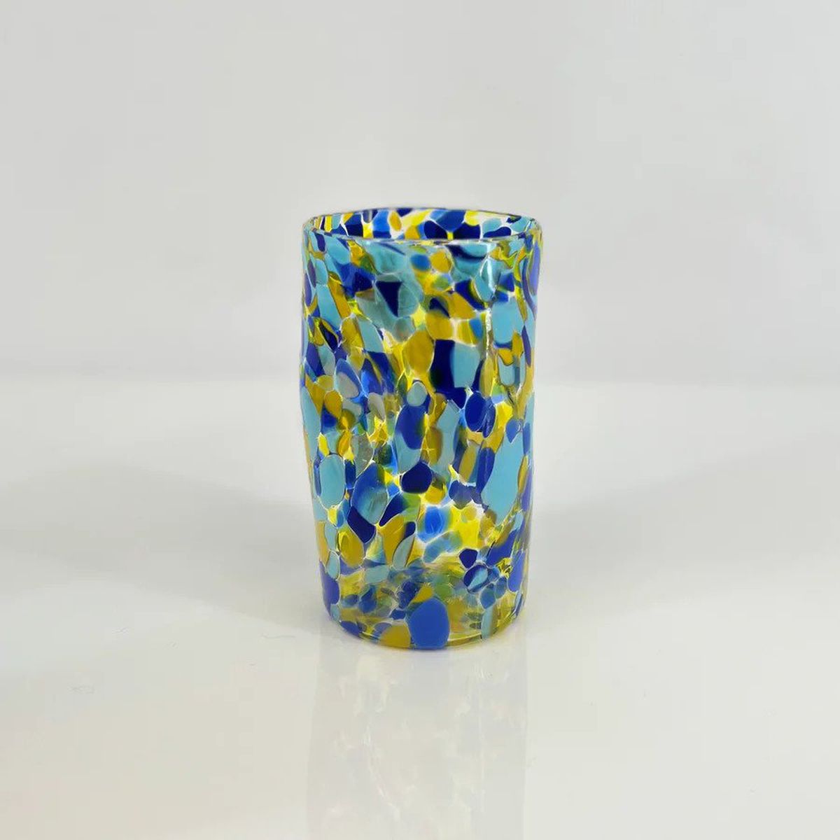 A blue and yellow piece of murano glassware