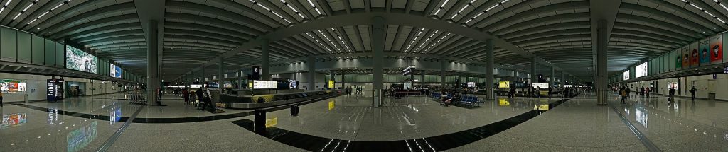 Suitcases on an airport baggage carousel