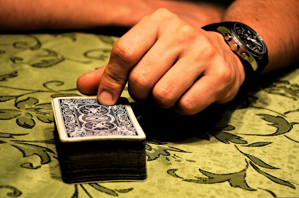 A shuffled deck of playing cards fanned out
