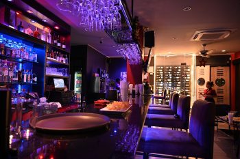 What Is a Speakeasy Bar? History, Style and Etiquette
