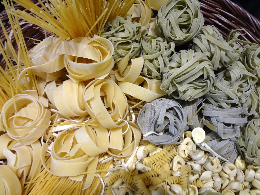 Fresh handmade pasta on a floured board