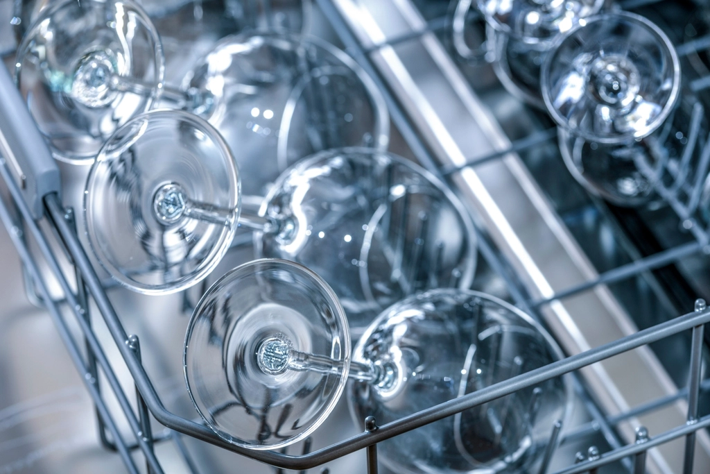 Glasses inside a commercial dishwasher