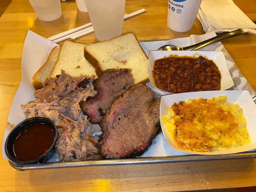 Sliced smoked brisket on a barbecue tray