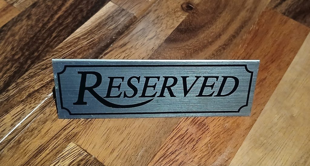 Reserved sign on a restaurant table